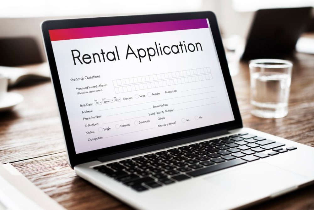 10 Essential Qualities of a Good Tenant: A Comprehensive Guide 1 A laptop screen displaying an online rental application form, underscoring the importance of attention to detail, a key aspect in evaluating what makes a good tenant.
